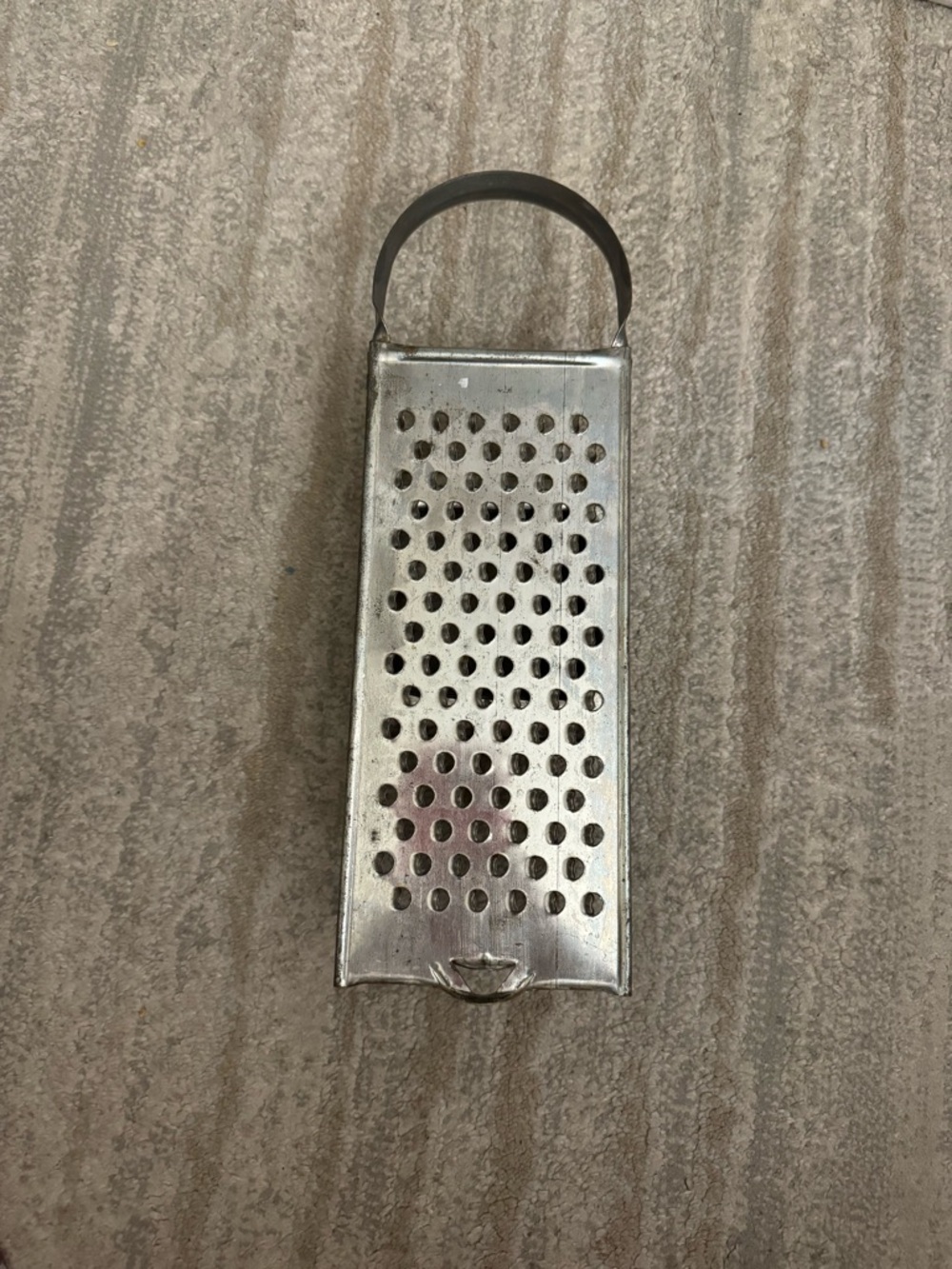 Metal spaetzle grate. Made in Germany.